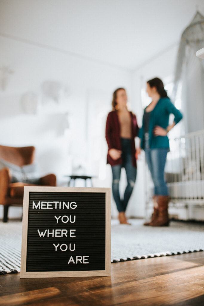Branding session of local Richmond business, containing a sign saying "Meeting you where you are."