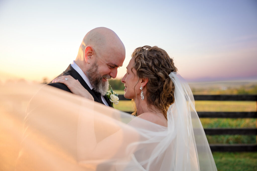 Intimate sunset wedding portrait of bride and groom by Kat Jones Creative
