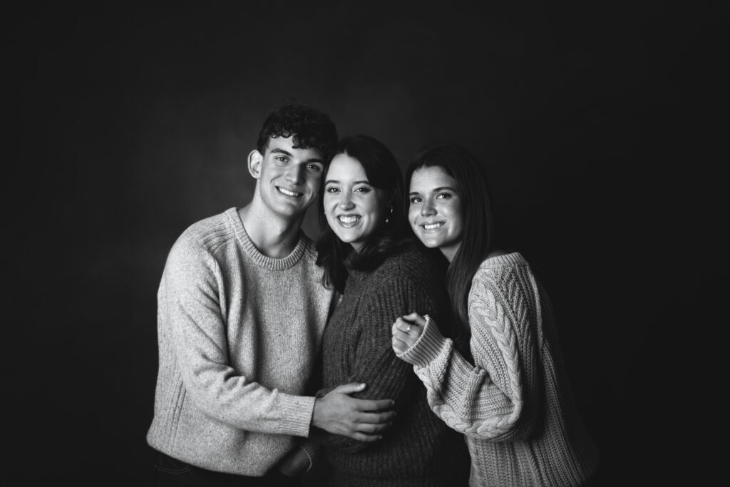 Black & white studio portrait of High School senior triplets at the Kat Jones Creative photography studio in Midlothian, VA
